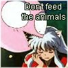 Shippo as a pink blob chewing on Inuyasha head with 'Don't feed the animals'